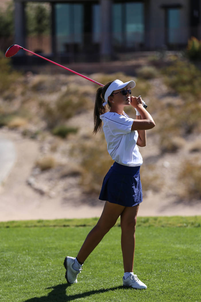 Centennial’s McKenzi Hall swings during the Class 4A Sunrise and Sunset Region girls g ...