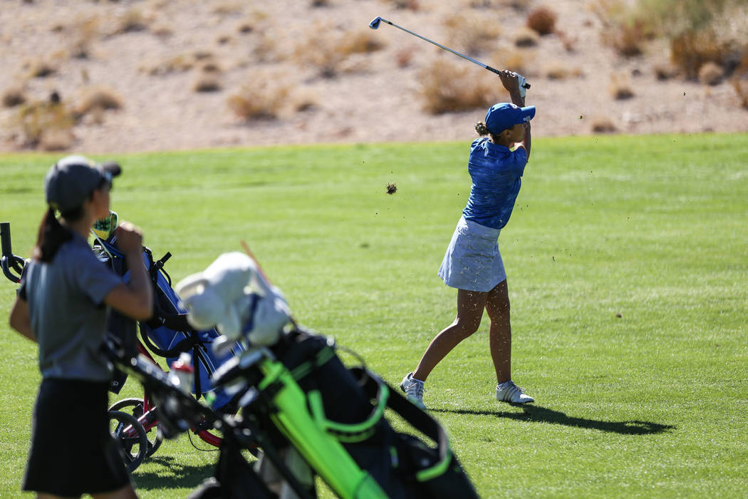 Bishop Gorman’s Hunter Pate swings during the Class 4A Sunrise and Sunset Region girls ...