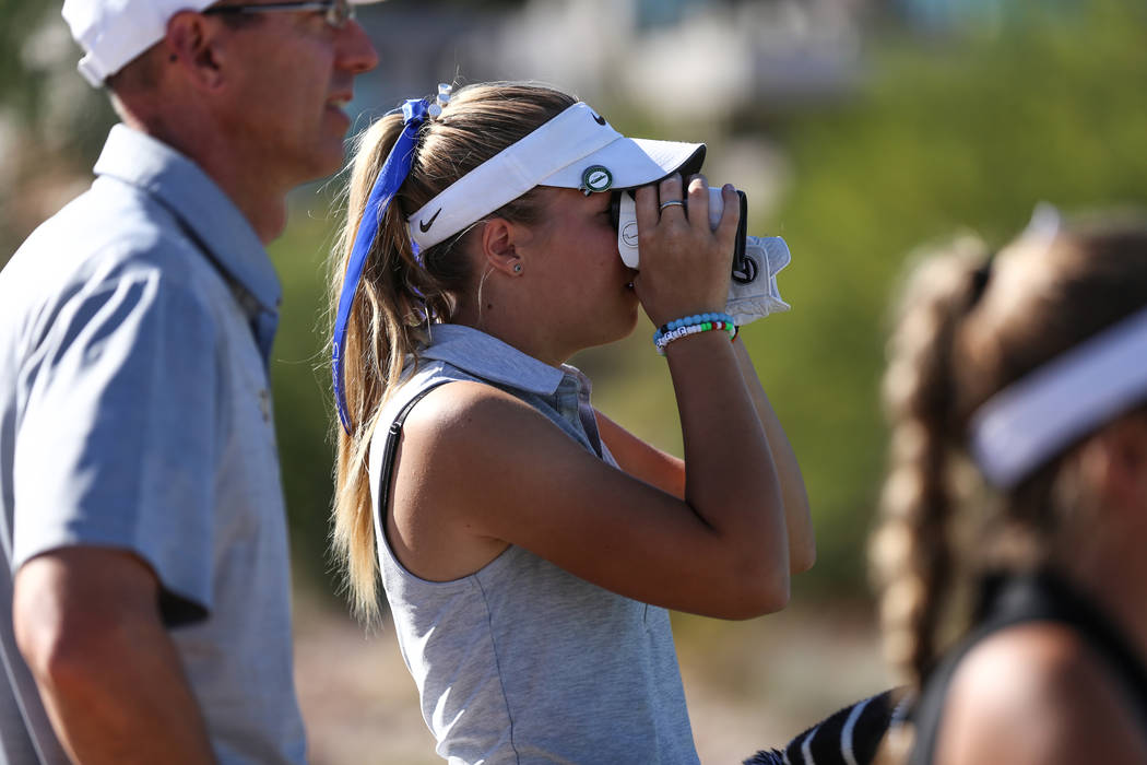 Faith Lutheran’s Sydney Smith scouts the golf course during the Class 4A Sunrise and S ...