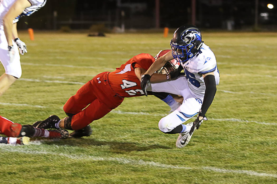 Vance Day tackles an Alamo players during the game on Friday against the Panthers. Pahranag ...