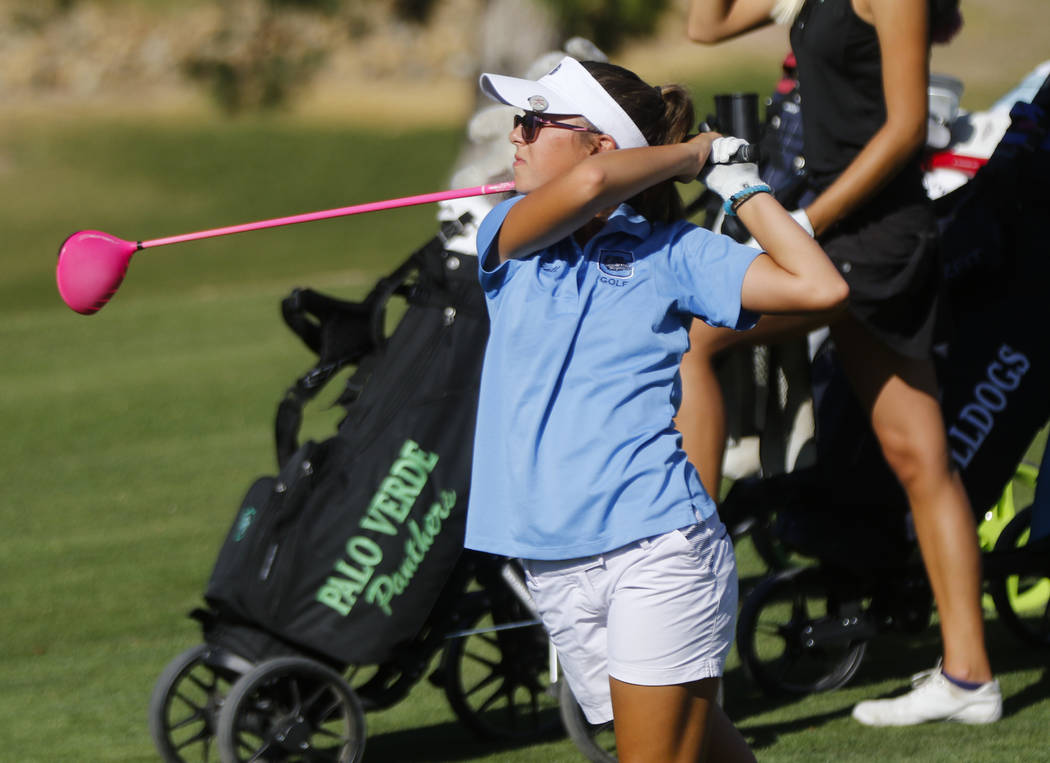 Centennial’s McKenzi Hall watches her tee shot during the Class 4A state girls golf to ...