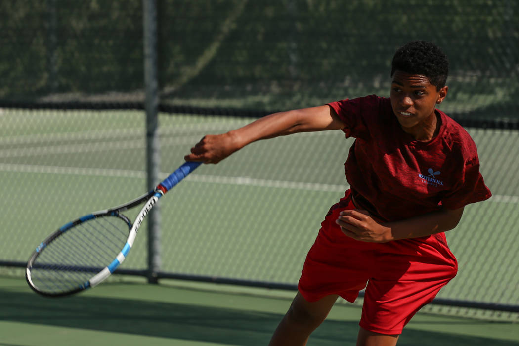 Rua Elmore of Western High plays against Sunrise Mountain’s boys tennis team at Wester ...