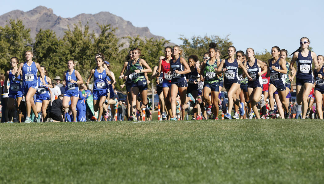 Runners compete during the Girls Cross Country Class 4A Sunrise Region race in Boulder City, ...