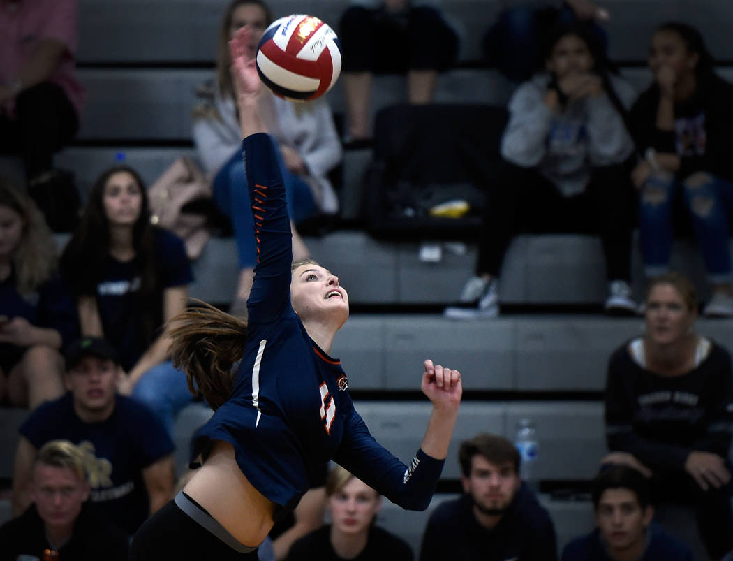 Bishop Gorman’s Kylie Gibson hits the ball against Shadow Ridge during a class 4A Suns ...