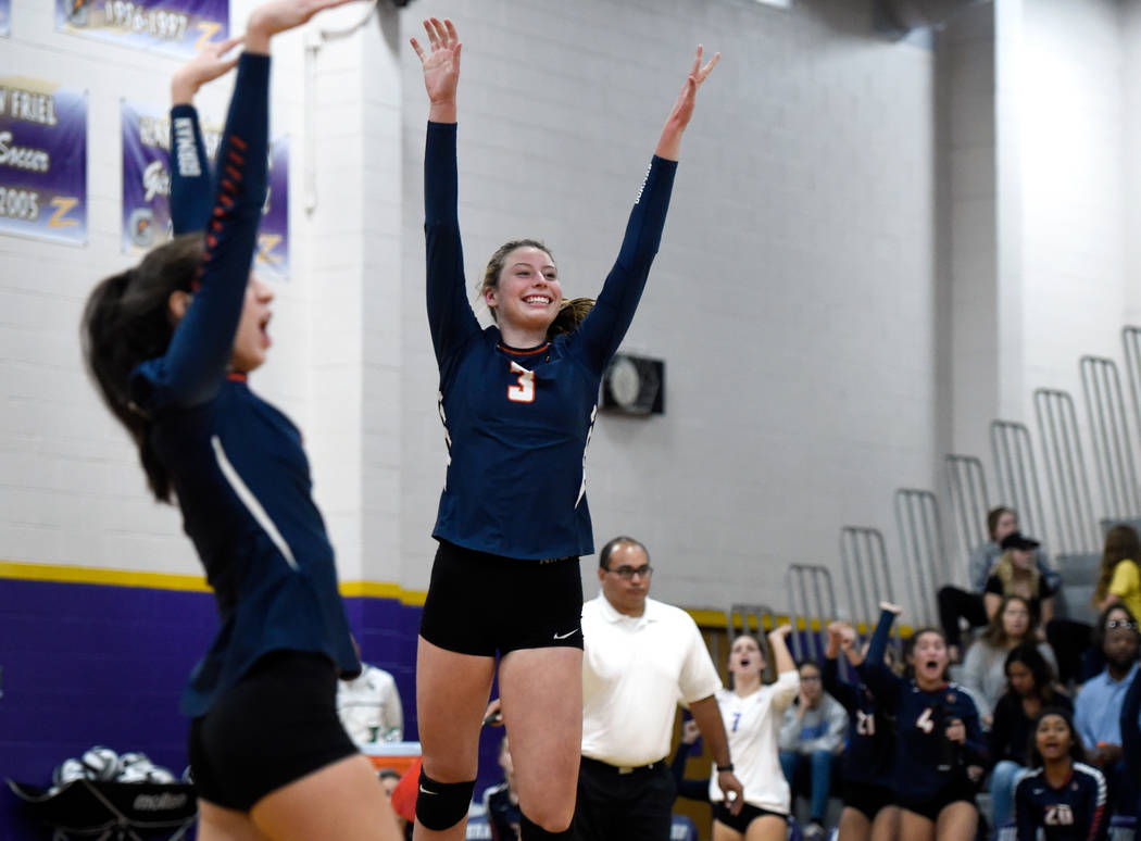 Bishop Gorman’s Sydney Lobato, left, and Tommi Stockham reacts after a point against S ...