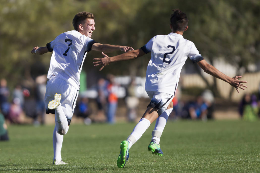 Coronado’s John Lynam (7) celebrates his goal against Eldorado with his teammate Noah ...