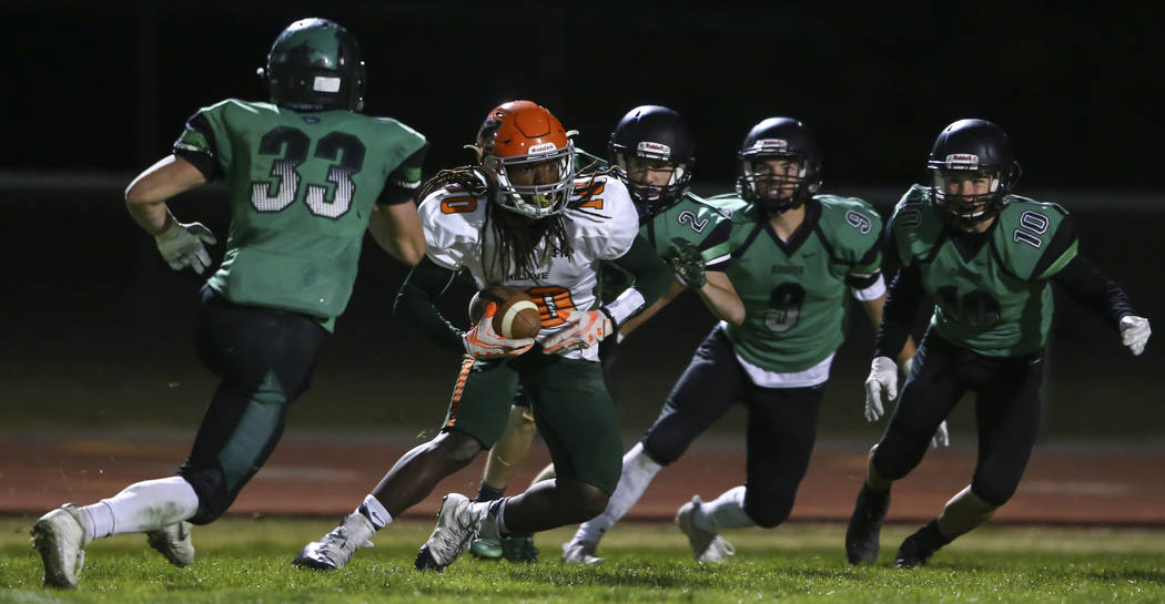 Mojave’s Noah Thompson (10) looks to get past Virgin Valley defense during the Class 3 ...