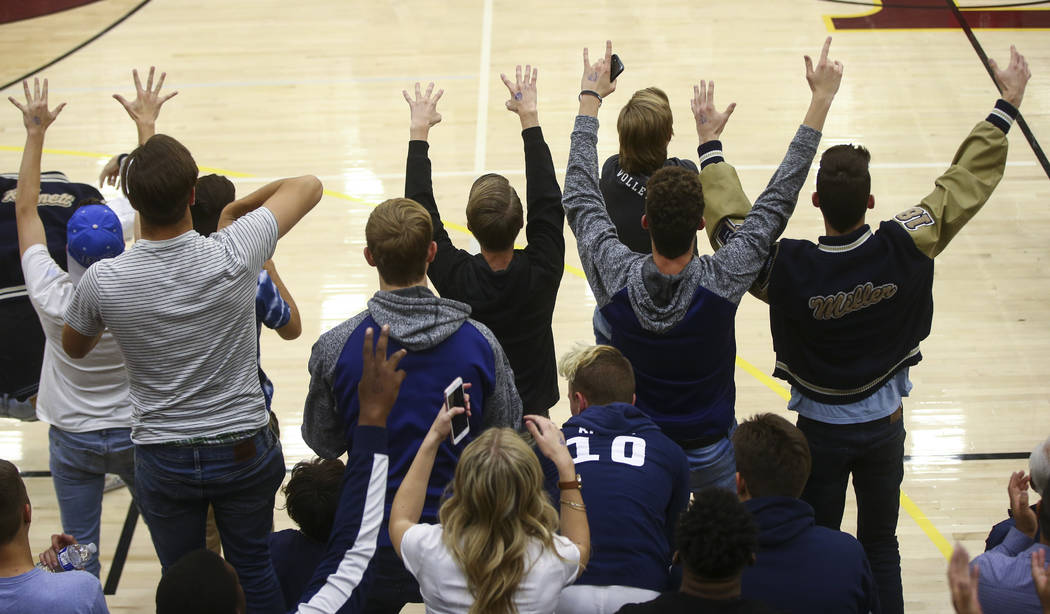 Shadow Ridge fans cheer as their team plays Coronado during the Class 4A state volleyball ga ...