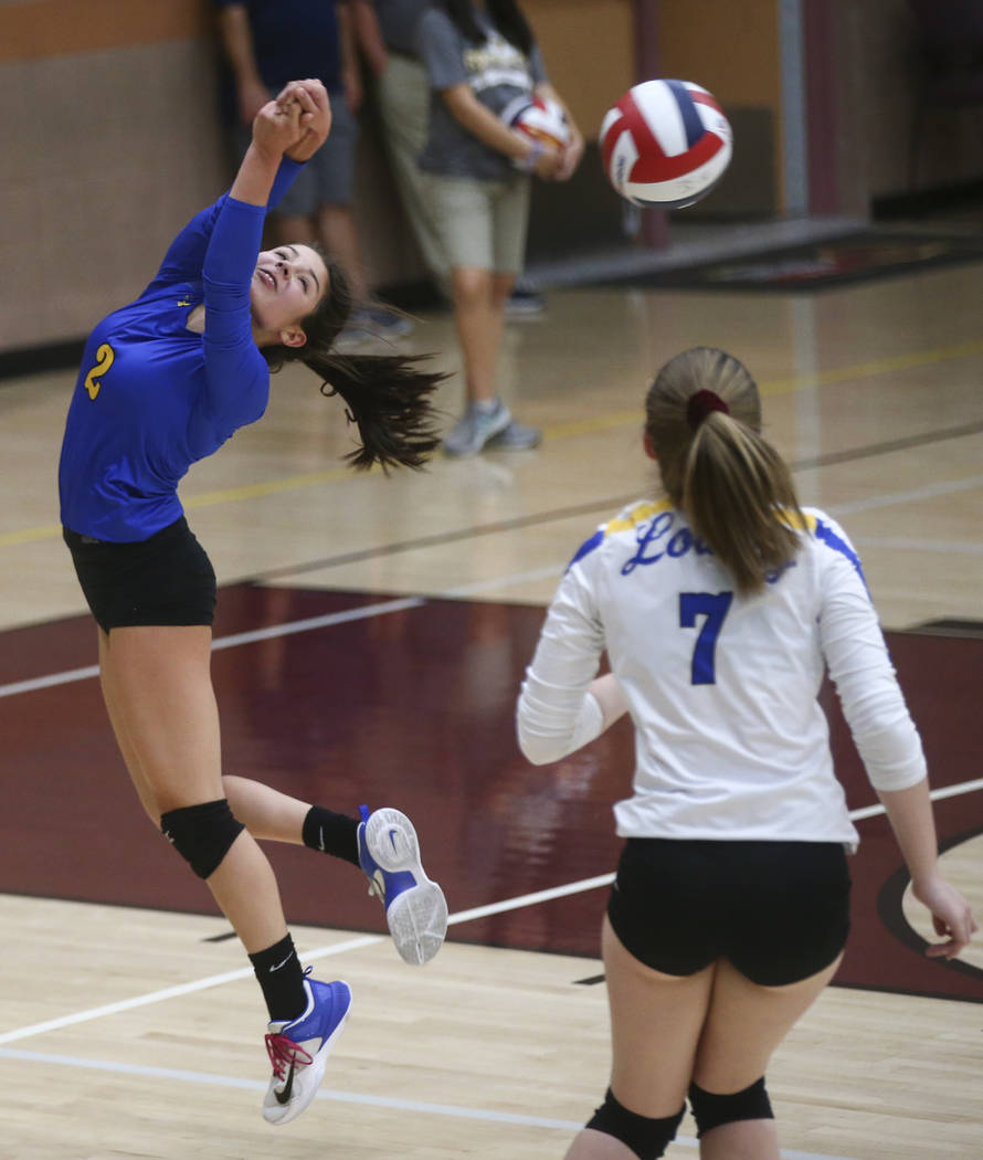 Lowry’s Kepa Bengochea (2) sends a shot over to Moapa Valley during the Class 3A state ...