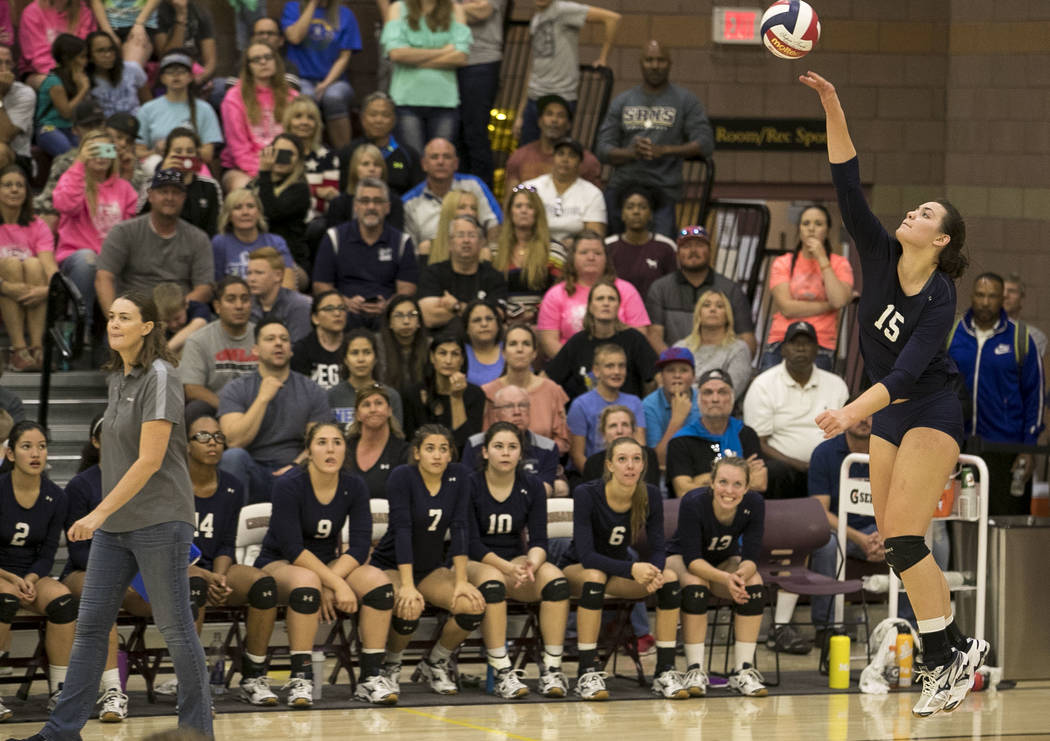 Shadow Ridge senior Whittnee Nihipali (15) serves the ball against the Gorman Gaels in the C ...