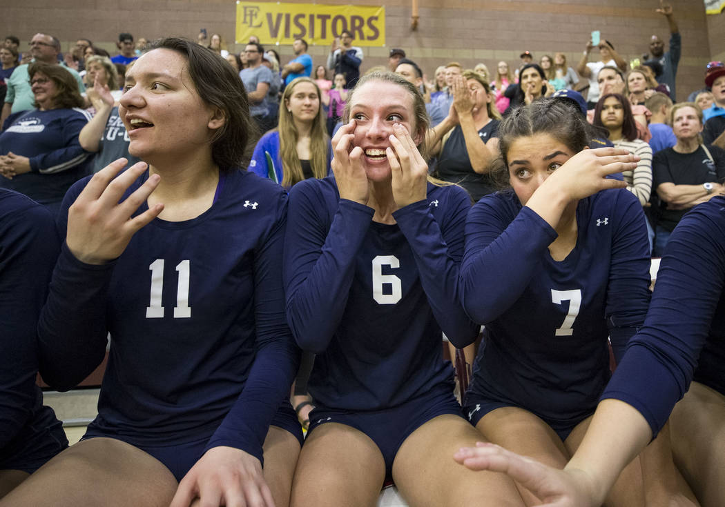 Shadow Ridge’s Madyson Lousignont (6) and Meghan Hoadley (7) react with tears of joy a ...