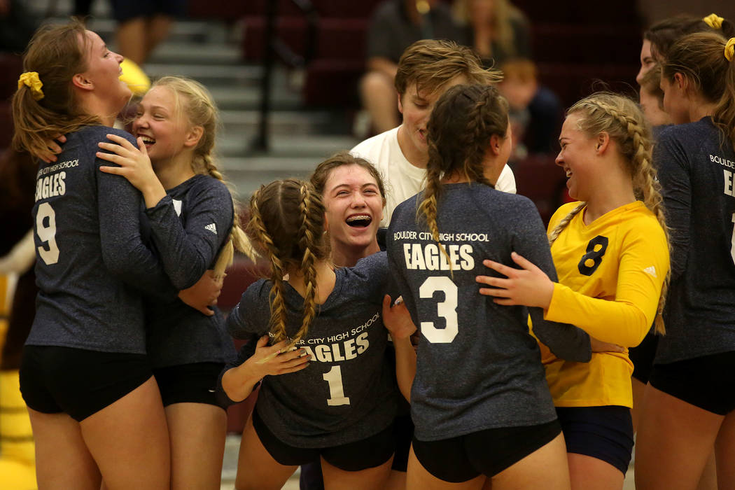 Boulder City teammates celebrate their 3-2 win over Moapa Valley during the class 3A state v ...