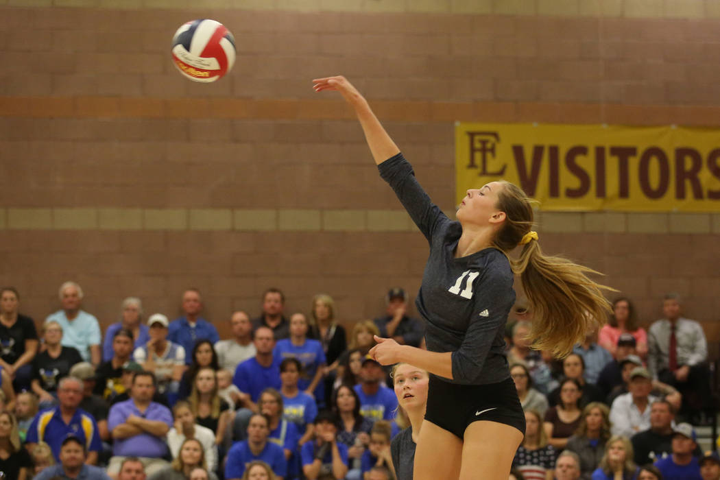 Boulder City player Kamry Bailey hits the ball to Moapa Valley during the class 3A state vol ...
