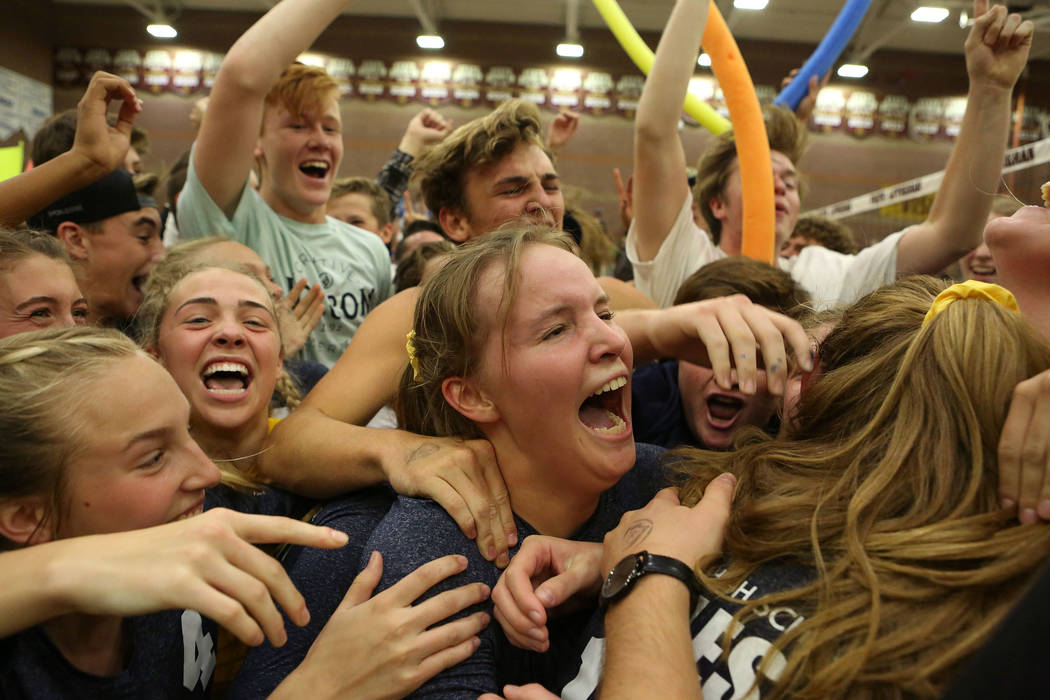 Boulder City teammates celebrate their 3-2 win over Moapa Valley during the class 3A state v ...