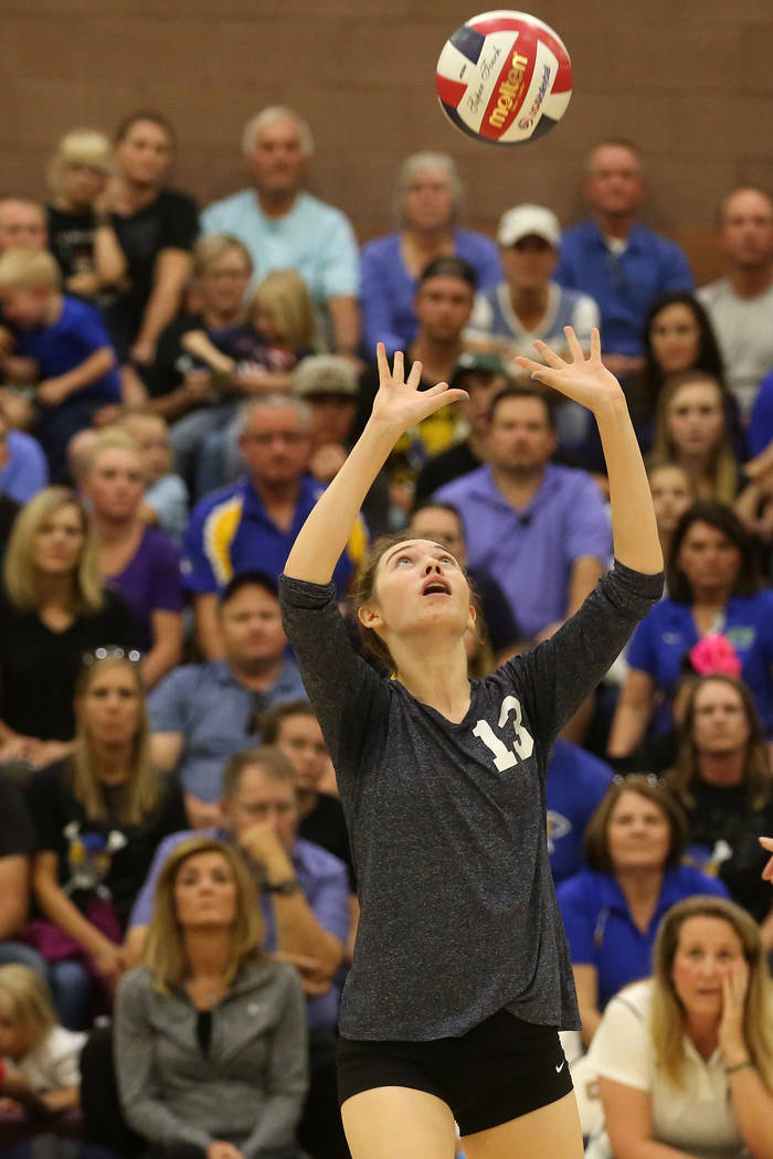 Boulder City player Raegan Herr sets the ball during the class 3A state volleyball champions ...