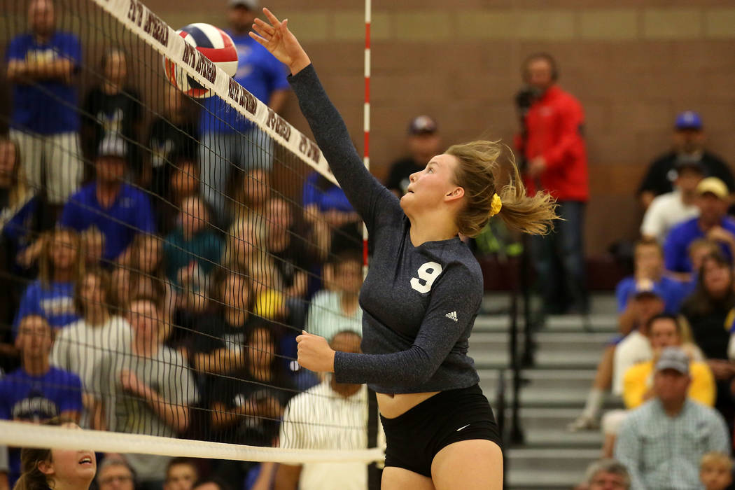 Boulder City player Jerra Hinson hits the ball over the net during the class 3A state volle ...