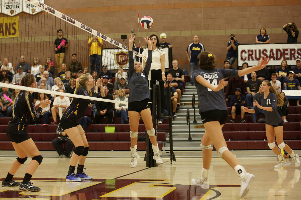 Boulder City player Ava Wright sets the ball during the class 3A state volleyball championsh ...
