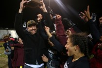 Cimarron-Memorial head coach Mark Bailey celebrates his team’s victory in last year&#8 ...