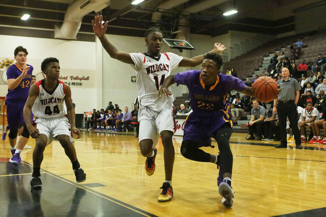 Durango player Vernell Watts (22) attempts to bring the ball to the basket during a game aga ...