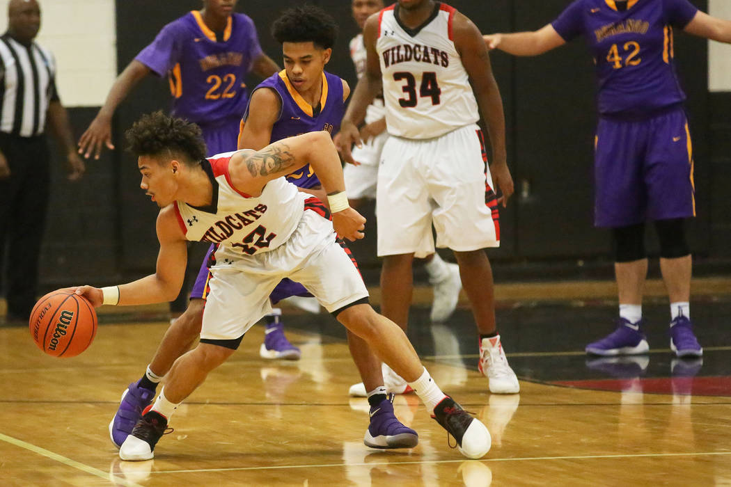 Las Vegas player Donovan Joyner (12) fights for the ball during a game against Durango at La ...