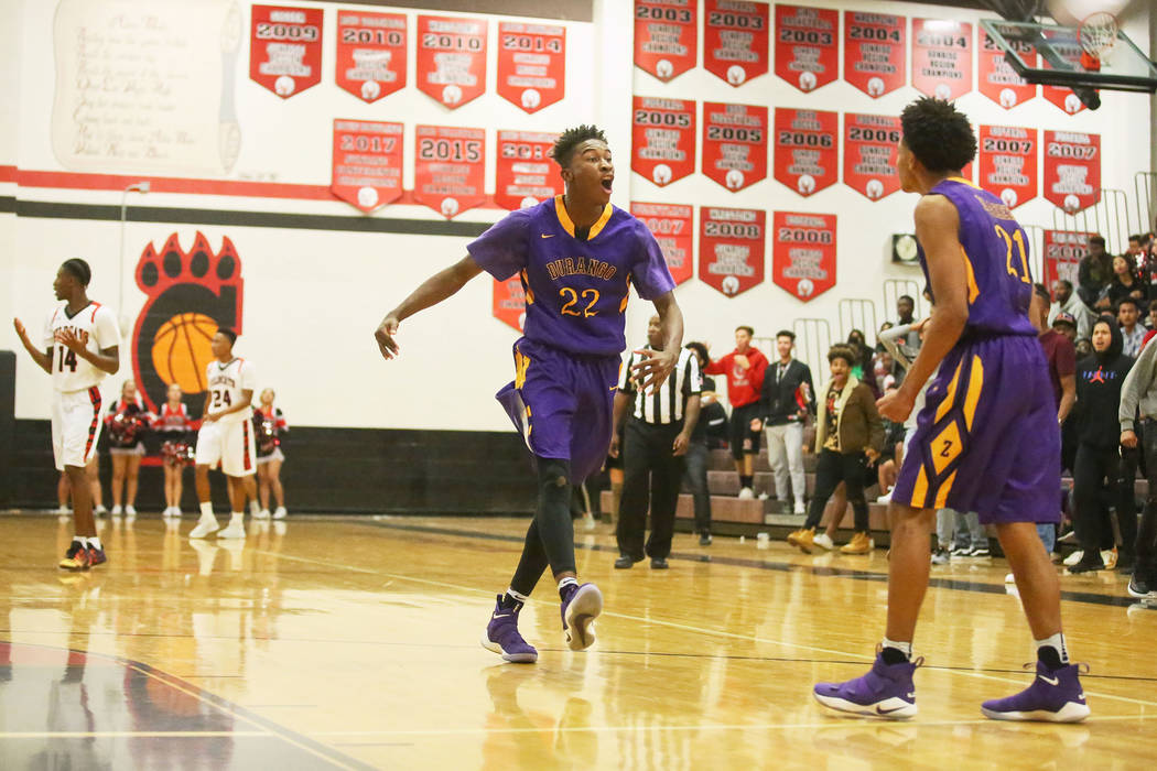 Durango players Vernell Watts (22) and Anthony Hunter (21) react after a play at Las Vegas H ...