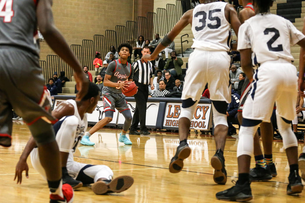 Arbor View’s Donovan Yap (0) prepares to shoot the ball against Democracy Prep during ...