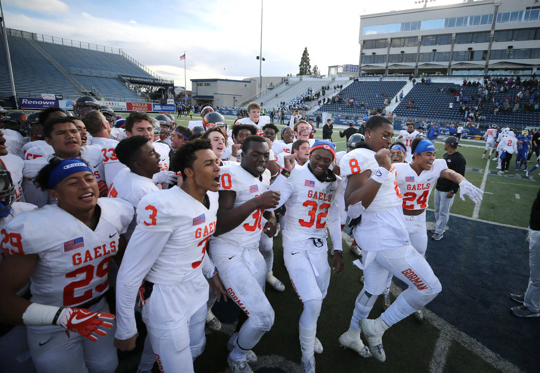 Bishop Gorman celebrates their 48-7 victory over Reed for the NIAA 4A state championship in ...