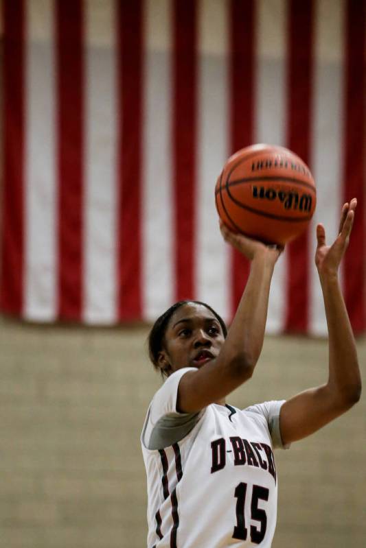 Desert Oasis’ Ahmaya Smith (15) shoots a free-throw during the second quarter of a bas ...