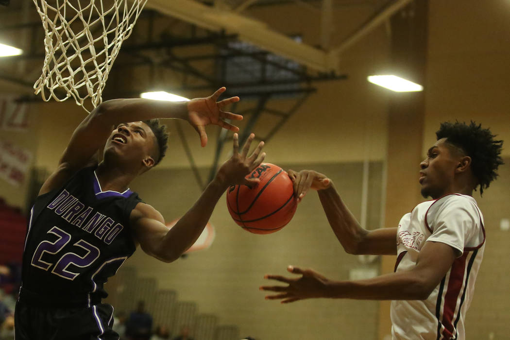 Durango player Vernell Watts (22) goes up for a basket during a game against Desert Oasis at ...