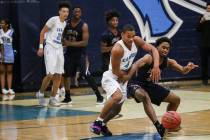 Canyon SpringsՠKevin Legardy (4), left, and Legacyճ Cristian Pitts (3), right, r ...