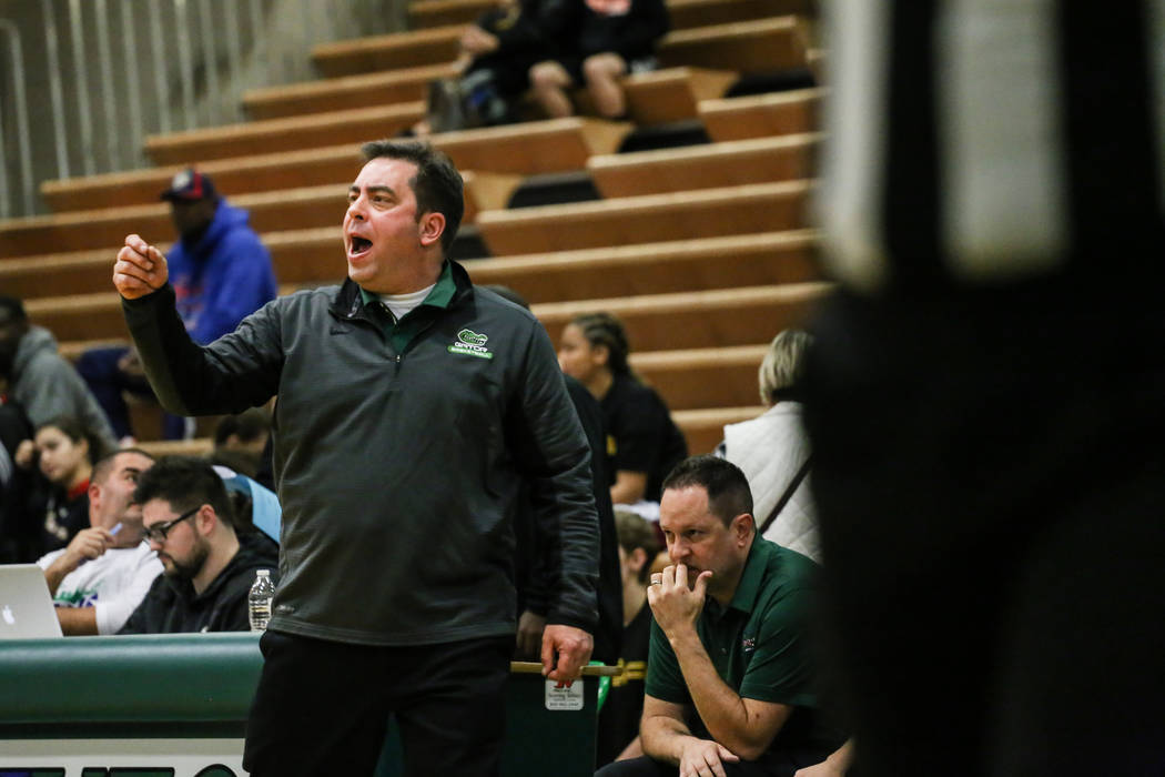 Green Valley head coach Eric Johnston reacts during the fourth quarter of a basketball game ...