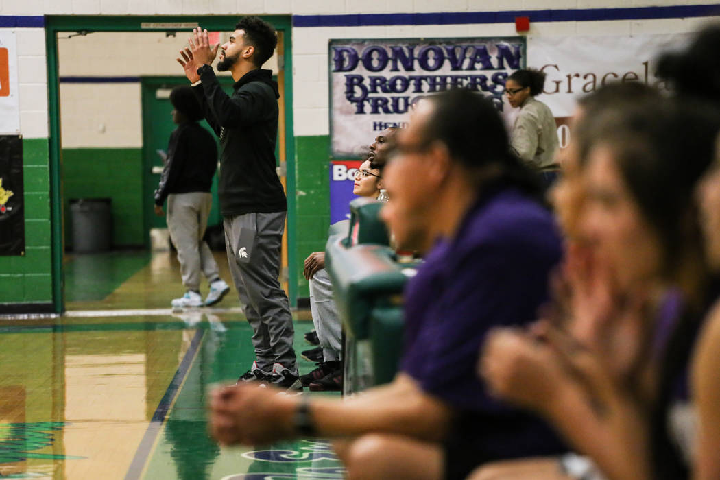Cimarron-Memorial head coach Malcolm Griffin reacts during the fourth quarter of a basketbal ...