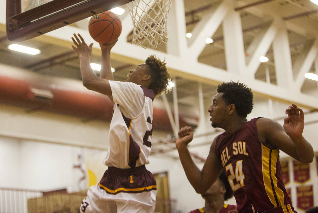 Eldorado’s Kemo Bell (23) throws a basket against Del Sol’s Nati Asfaw (24) in L ...