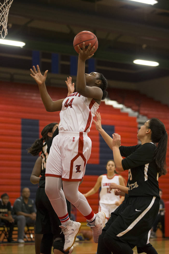 Liberty’s Dre’una Edwards (44) goes up for a shot against Bonita Vista in the gi ...