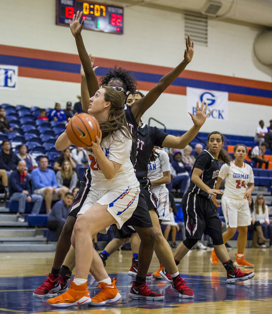 Bishop Gorman’s Tierney Holcombe looks for a shot against Desert Oasis defenders at Bi ...