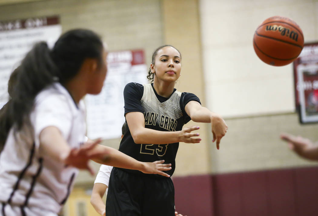 Spring Valley’s Alexus Quaadman (23) passes the ball during a basketball game at Deser ...