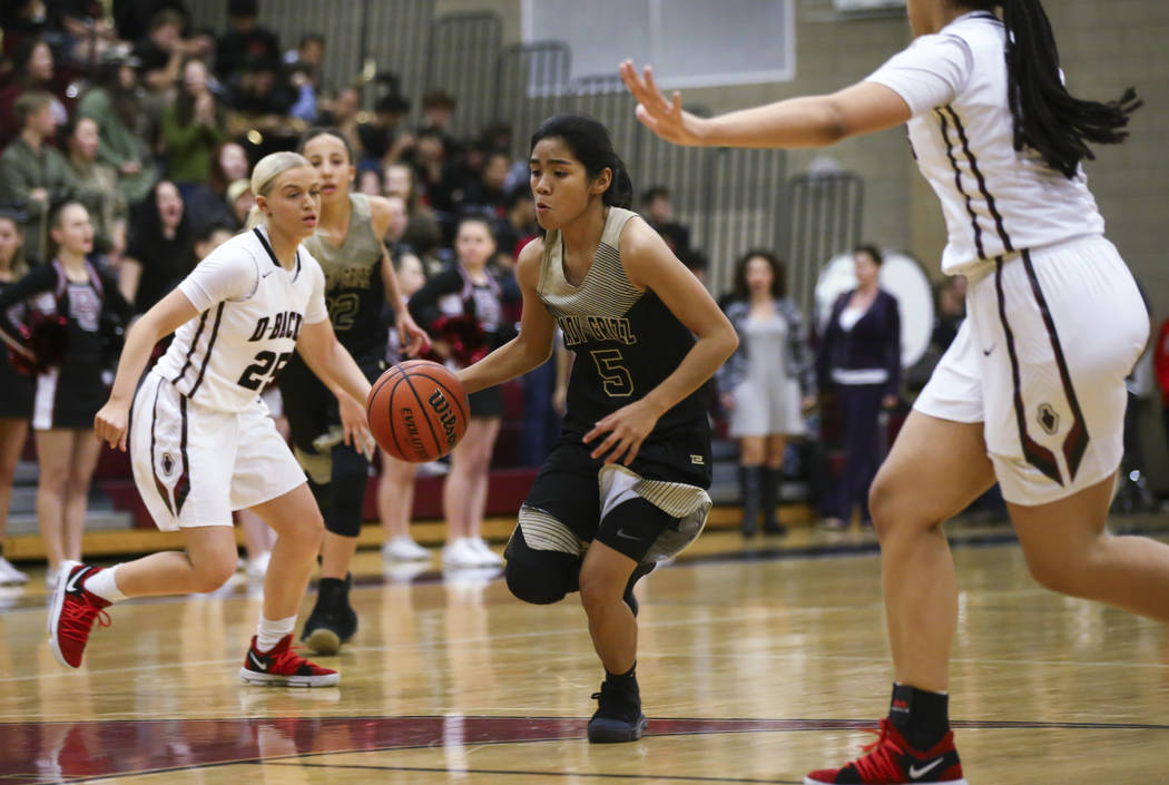 Spring Valley’s Chelsea Camara (5) heads for the basket during a basketball game at De ...