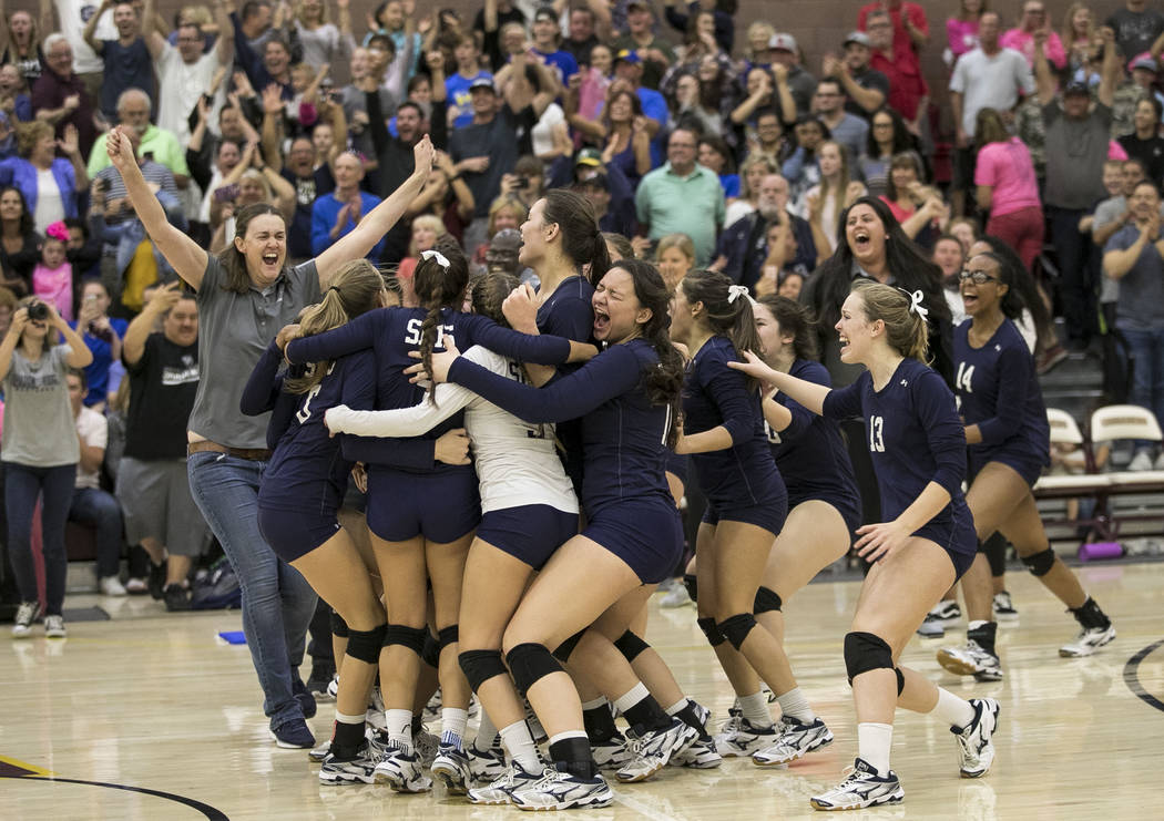 Shadow Ridge celebrates after defeating the Gorman Gaels in the Class 4A state volleyball ch ...