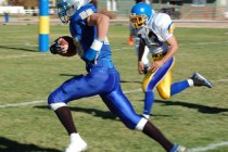 Alamo’s Brady Whipple outruns Emmi Sandoval of Coleville to the goal line