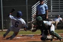 Sierra Vista’s Cole Crosby slides home as Rancho catcher Chris Fitzpatrick tries to co ...