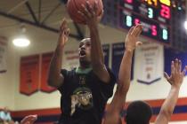 Las Vegas Prospects 17s guard Shaquile Carr drives to the basket Wednesday against the Wisco ...