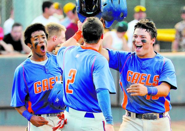 Bishop Gorman’s Michael Blasko, right, celebrates his three-run home run with teammate ...