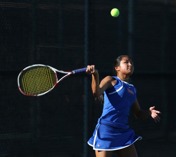 Bishop Gorman sophomore Amber Del Rosario keeps her eye on the ball during a Division I stat ...