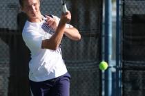 Coronado sophomore Ryland McDermott returns a ball during a Division I state championship ma ...