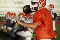 Mojave quarterback Zack Arave, shown Tuesday at practice, was a second-team all-state pick b ...