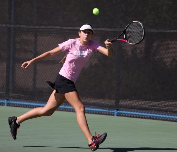 Faith Lutheran junior Kathleen Wright returns the ball during a Division I-A state champions ...