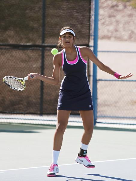 The Meadows senior Anjali Daulat returns the ball during a Division I-A state championship m ...
