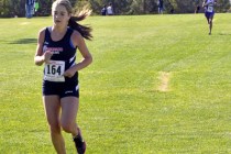 STEVE ANDRASCIK/LAS VEGAS REVIEW-JOURNAL Coronado High School runner Sara Dort (164), approa ...