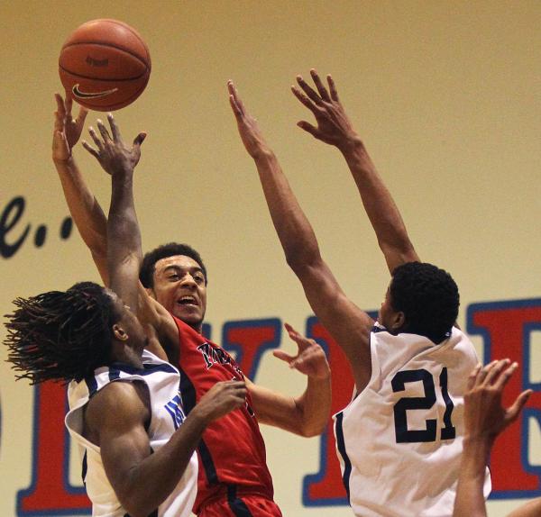 Nigel Williams-Goss, center, is Findlay Prep’s first four-year player and the Pilots’ se ...