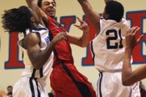 Findlay Prep’s Nigel Williams-Goss (0) gets off a pass while being guarded by the Impa ...